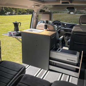 Travel cabinet, kitchen cabinet, laptop cabinet behind the driver's seat - Volkswagen New Multivan T7, New California Beach T7